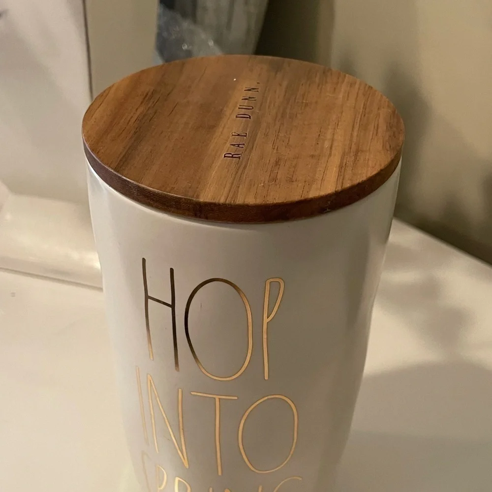 NWT, Rae Dunn, Ceramic Canister with wooden lid. “Hop Into Spring”